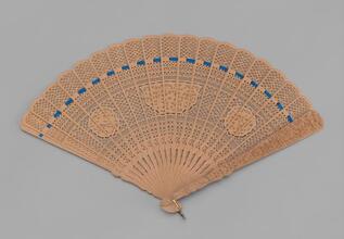 Brisé fan of pierced and fretted sandalwood