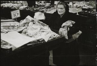 The 5 and 10 [Woman shopping at Woolworth's.]