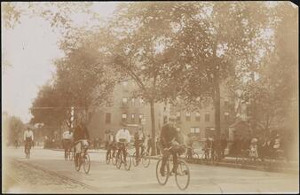 [People riding bicycles.]