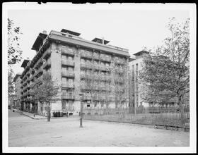 76th Street at the N.W. corner of Cherokee Place. Vanderbilt open stair tenements.