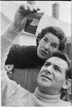 Leonard Bernstein [Leonard Bernstein and a woman looking at a negative.]