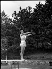 Billy Rose [Eleanor Holm on a diving board.]