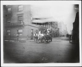 [Horse-drawn fire engine.]