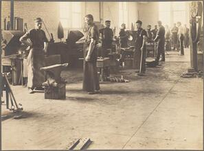 [Workers in a Brooklyn Rapid Transit machine shop.]