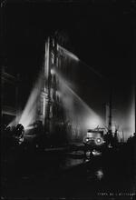 [Building on fire.]