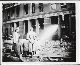 [Firemen at scene of fire.]