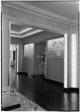 Steuben Glass, Inc. Vista from office to lighted cases.