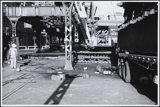 [The operator of the crane.]