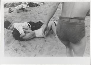 [Teenagers playing on beach at Coney Island.]