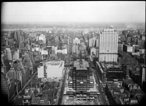 [Aerial view of construction in Midtown.]