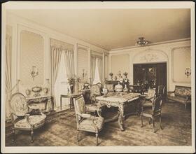 [Residence. Interior, sitting room.]