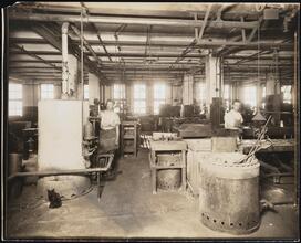 [Interior, manufacturing shop.]