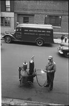 Paddy Wagon [Man with welding equipment used in the making of the television show Paddy Wagon.]