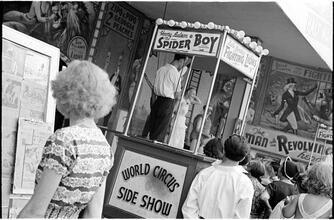 [Sideshow performers on Coney Island midway.]