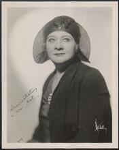 [Sophie Tucker demonstrating a new hat.]
