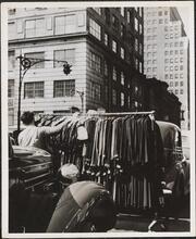 Garment district, pushing racks through the streets