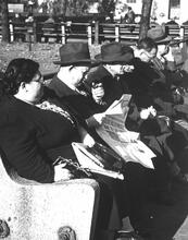 Untitled [Crowded park benches in Union Square]