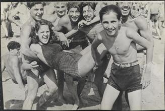 [Teenagers playing on Coney Island beach.]