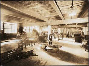 [Interior, manufacturing shop.]