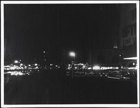 Asleep. [Times Square at night.]