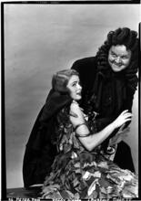[Peggy O'Hara as Wendy and Lawrence Tibbett as Captain Hook.]