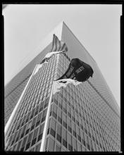 1285 6th Avenue. Equitable Life Assurance Society, exterior view, flags at corner of 51st Street and 6th Avenue.
