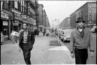 Changing New York [8th Avenue between 116th and 117th Streets.]