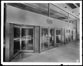 100 Park Avenue. Apartments, main entrance exterior, bronze doors.