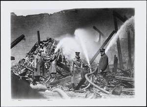 [Firemen at scene of fire.]