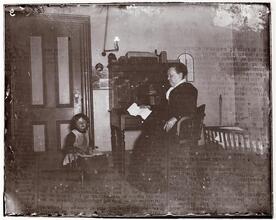 Matron Welbe of the Lost Children's Dept. of Police Headquarters, with one of her charges.