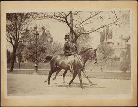 [Theodore Roosevelt and a woman, most likely his wife, riding horses.]