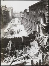 [Street in ruins after a dynamite explosion above the 7th Avenue subway station between 23rd and 25th Street.]
