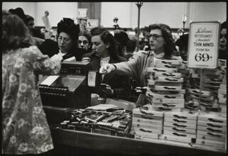 The 5 and 10 [Women paying for their purchases at Woolworth's.]