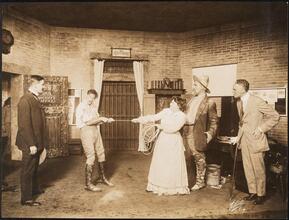 ["Believe Me Xantippe" theater still.]