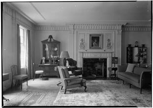 Walter Rothschild [residence]. Living room to fireplace.