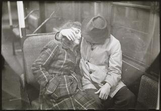 Life and Love on the New York City Subway [Couple on a subway.]