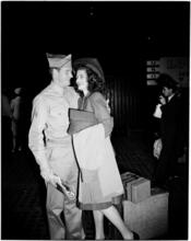 Penn Station [Soldier reuniting with a woman.]