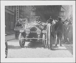 [Fire truck with fire fighters.]