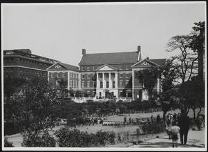 East 103rd Street and Fifth Avenue. Museum of the City of New York. View from Central Park looking east