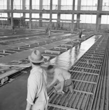 [Interior of factory.]