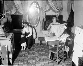 Kitchen Interior, Woman Ironing and Man with Small Child