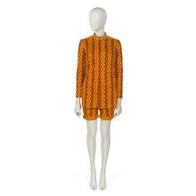 Ensemble comprising tunic and pair of shorts