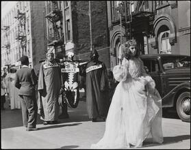 Victory Parade, view of fairy princess in front of figures dressed as Hitler, Hirohito, and Mussolini, 105th Street