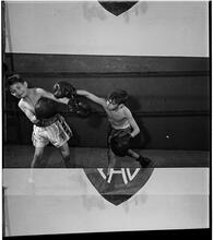 Boxing [at the] Police Athletic League [Two boys boxing.]
