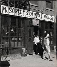 [Men leaving McSorley's Old Ale House, 15 East 7th Street.]
