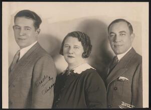 [Eva Mandel Wolf with two unidentified men.]