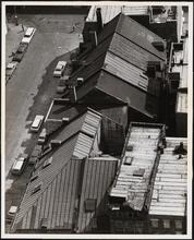 [Aerial view of the rooftops of Schermerhorn Row.]