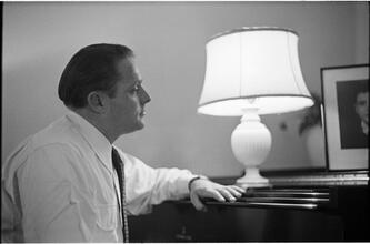 Christopher Lynch [Christopher Lynch, Irish tenor, at a piano.]