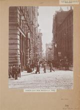 Wall Street N.Y. [Wall Street Looking East from Broadway.]
