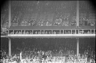 Football Writers [Fans in the stadium.]